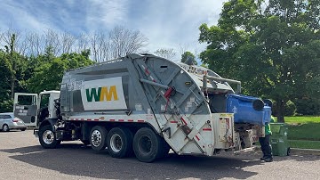 Ex Advanced Disposal Mack MRU McNeilus rear loader garbage truck