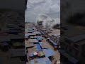 🌊😱 Tsunami Strikes Unaware Beachgoers — Pure Panic Captured on Camera!