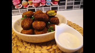 Falafel Di̇ğer İsmi̇yle Nohut Köftesi̇ Nasil Yapilir ? Tahi̇nli̇ Yoğurtlu Sos Eşli̇ği̇nde Falafel Tari̇fi̇