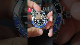 Setting the time and date on an NH34 watch