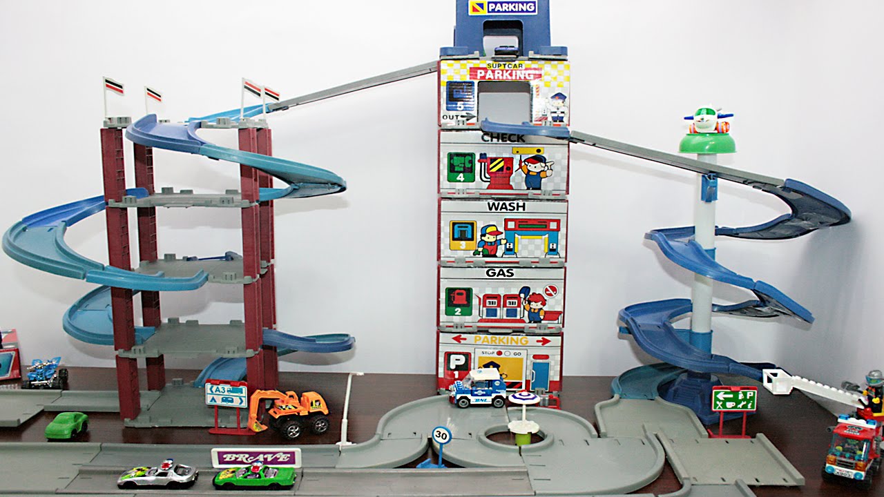 Toy Racing Cars Track Play Video for Kids | Multi Level Garage Racing Fun