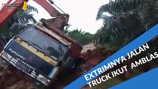 TRUCK PENGANGKUT SAWIT AMBLAS  DI BANTU  EXCAVATOR