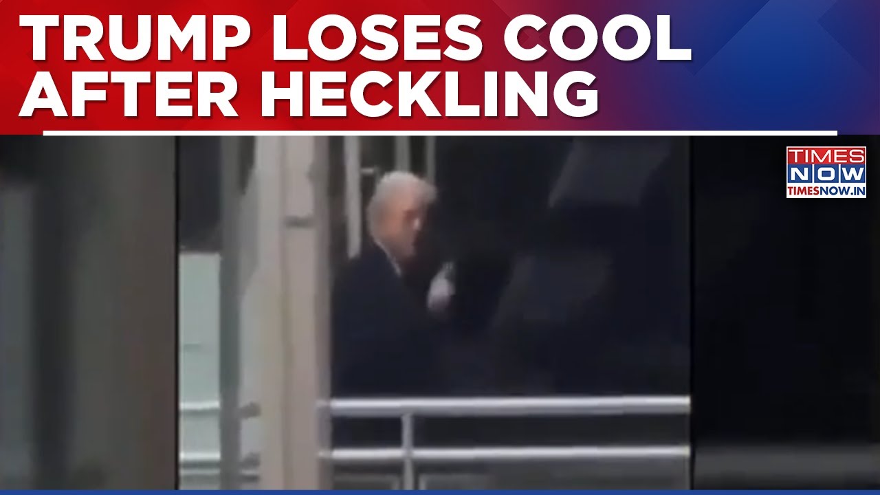 Trump Heckled Over Epstein Claim At Detroit Event, Appears To Lash Out With Obscene Gesture On Cam