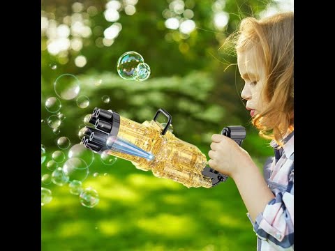 Іграшковий дитячий бластер генератор пускач мильних бульбашок на батарейках проектор динозаврів світло розчин, відео 1
