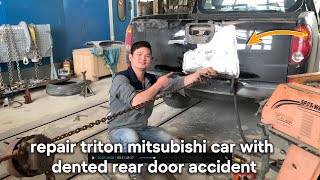 Repair triton Mitsubishi car with dented rear door accident