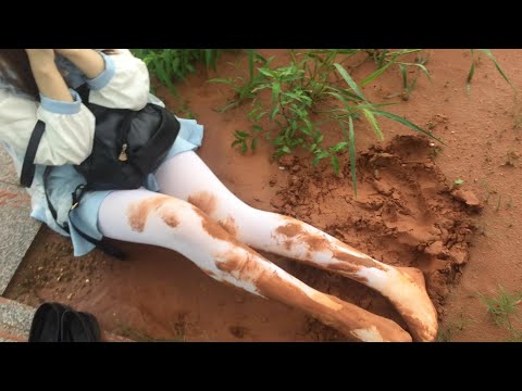 Rugu playing in the mud in white pantyhose