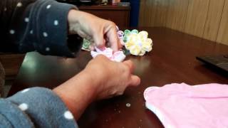 How to make baby washcloth flowers and suckers.