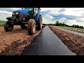 6TH GENERATION VEGETABLE FARMERS PREPARE SOIL FOR PLANTING.