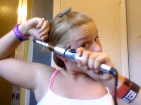 Girl gets hair burnt off with curling iron