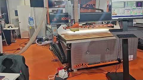 CNC router with 12-tool Automatic Tool Change (ATC) magazine realised with ETH-MCI motion controller