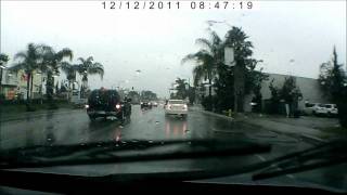 Rainy day driving footage using DealExtreme/SainSpeed car DVR dash camera.