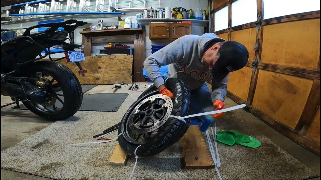 Short version of The best How to NOT install a motorcycle tire on YouTube zip ties make it easy