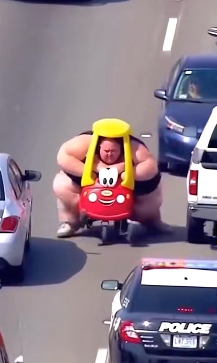 Obese Man Evading Police In Children’s Toy Car - Sora Ai #shorts #ai #traffic