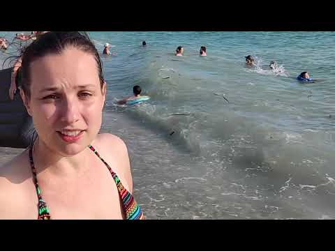 На море с