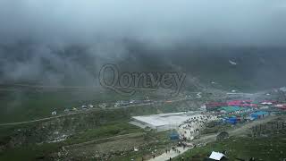 Kedarnath, India: Hindu Temple and pilgrimage aerial shot in clouds | Stock Video