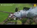 Huge fire breaks out in barn in Greater Manchester