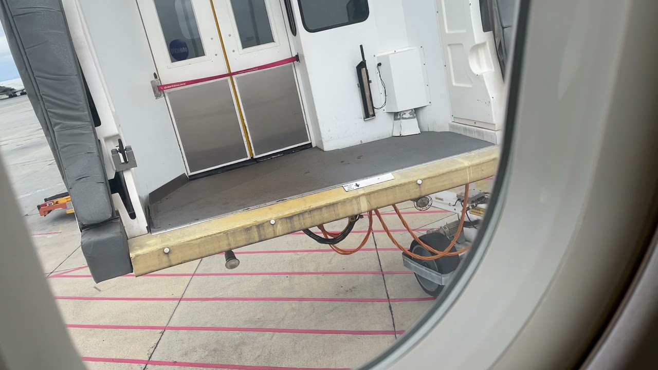 The carriage moving away from our Qantas flight to Broome