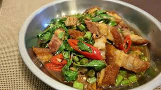 Stir fry roast pork with basil leaves