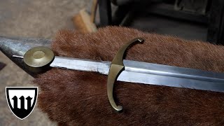Forging a arming sword, part 4, making the pommel.