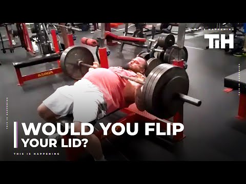 Man Slaps Friend's Belly to Motivate Him as He Struggles While Lifting Weights