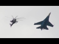 Пролёт истребителя Су-27 АГВП &quot;Русские витязи&quot; в строю с боевыми вертолётами Ми-28Н АГВП &quot;Беркуты&quot;.