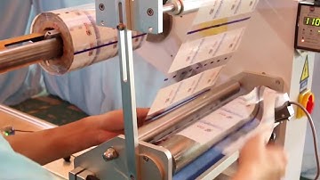 how to set up the film roll, install the package film on flow wrapper