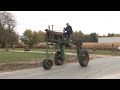 This classic tractor stands extra tall its an unstyled 1938 john deere b on stilts