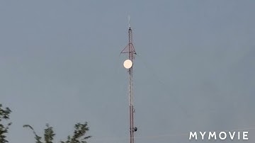 Red and white tower with dual strobe and smoke stack with modern incandescents in Columbia