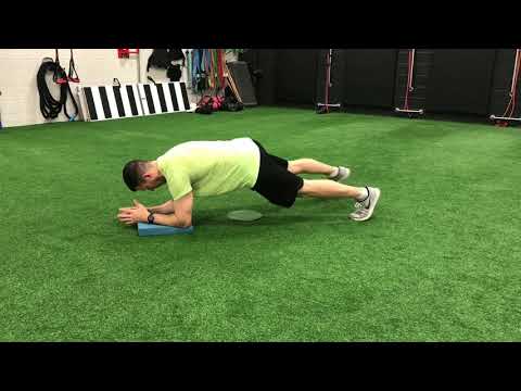 Elbow Plank with Toe Taps