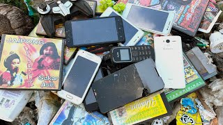 Lots of phones strewn in the trash || Seriously damaged phone restoration