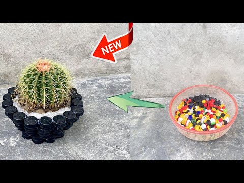 Recycle plastic bottle caps to make beautiful and unique black flower vases