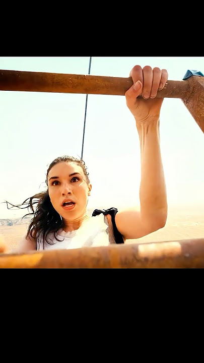 Two reckless girls climb a kilometer-high tower barehanded.