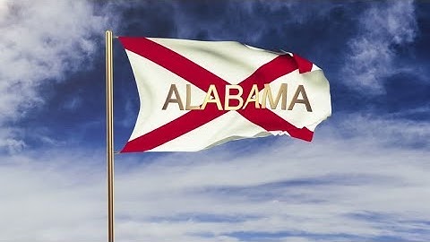 4K alabama flag with title waving in the wind. Looping sun rises style. Animation loop Stock video