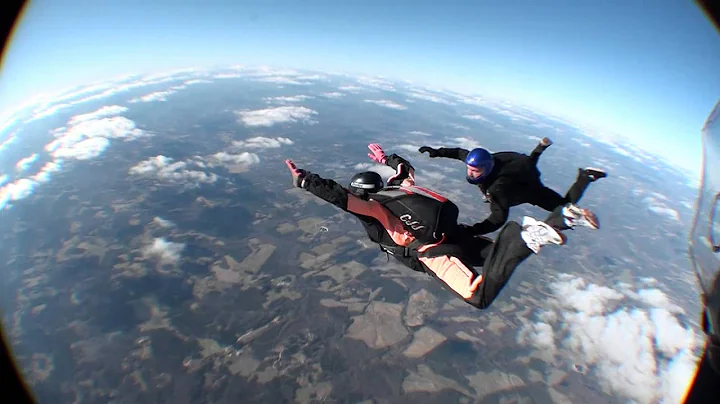 Skydiving: AFF CAT D with instructor releasing dive