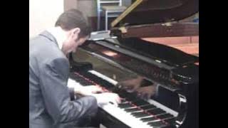 Christos Tsitsaros, Univ of IL, playing new Kimball Baby Grand