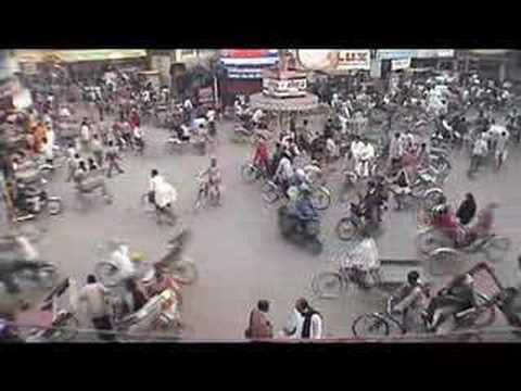 Things are all backwards as my wife attempts to read the incredibly awesome graphic novel 'A Pilgrimage to Kashi' at a traffic roundabout in Varanasi, India This video was produced by www.PangealityProductions.com To follow my work become a fan on Facebook at http