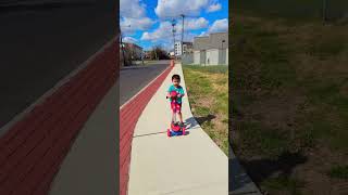 Cute Kid Wants To Overtake Car By Scooter 