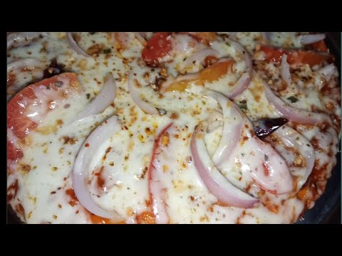 Video: Hvordan Man Laver Pizza Med Løg Og Tomater