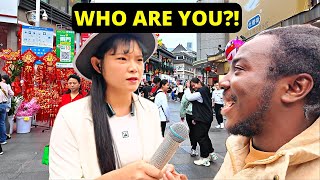 CHINESE GIRL SHOCKS AT A BLACKMAN SPEAKING CHINESE LANGUAGE IN THE STREET...BLACK IN CHINA