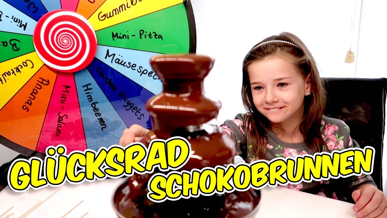 GLÜCKSRAD Schokobrunnen Challenge 😂 Bockwurst mit Schokolade 😖 Lulu & Leon