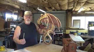Dragon Intarsia Part 6 Well this is it. I am done with the dragon, it turned out OK I think. What we have here is some sanding, a little recap and a finial look