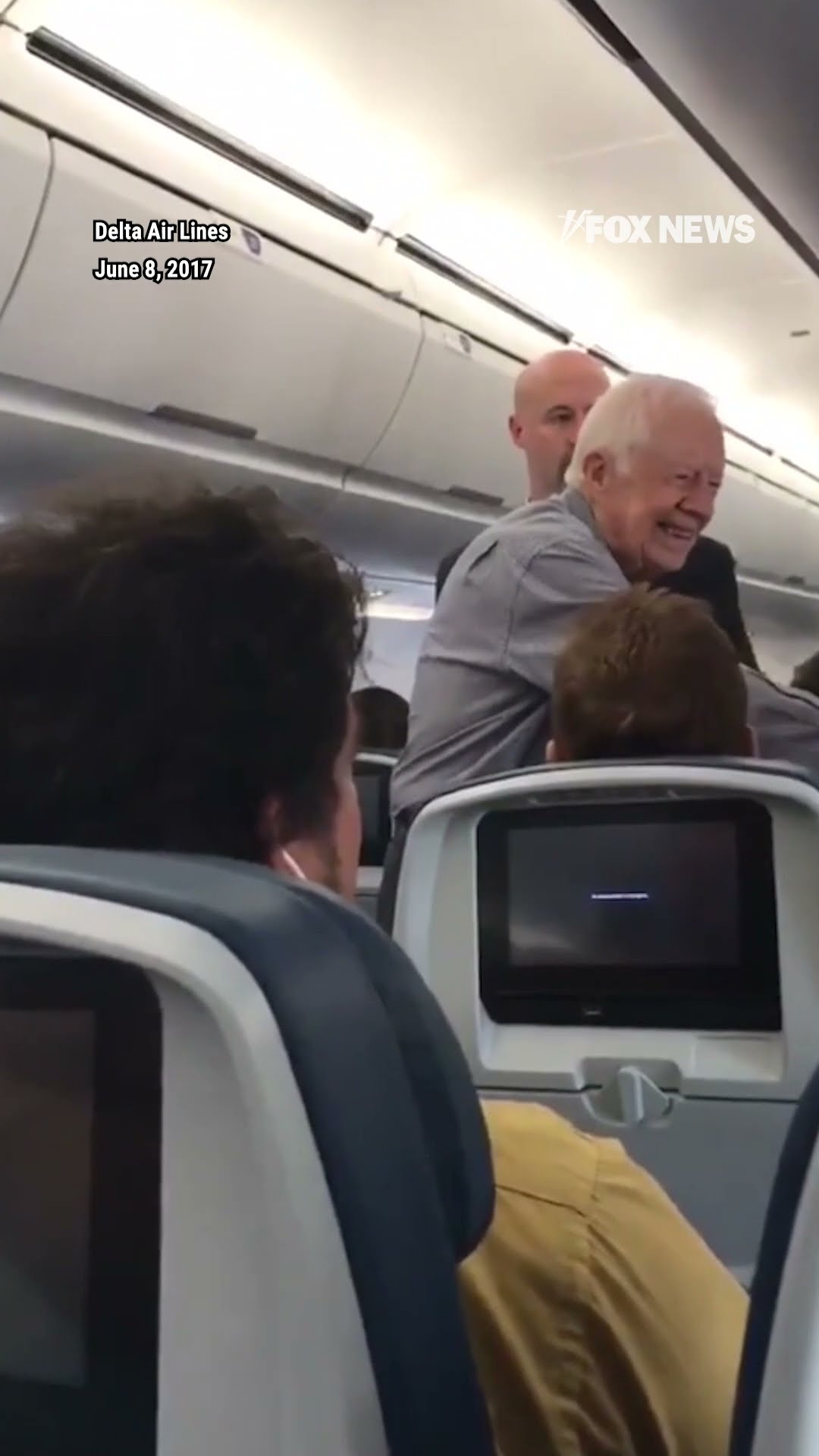 Flashback: Former President Jimmy Carter shakes hands with every passenger on Delta flight