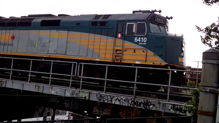 TRAINS Close UP of Via Rail LRC Train over Lachine Canal in Montreal