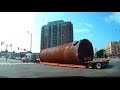 Oversize load video, big rig moving, heavy haul assistance. High pole, utilities required Super load