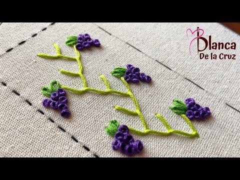 Bordar puntada decorativa con variante de punto coral o punto de pluma.