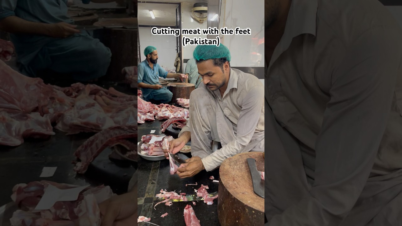 Cutting meat with the feet (Pakistan)