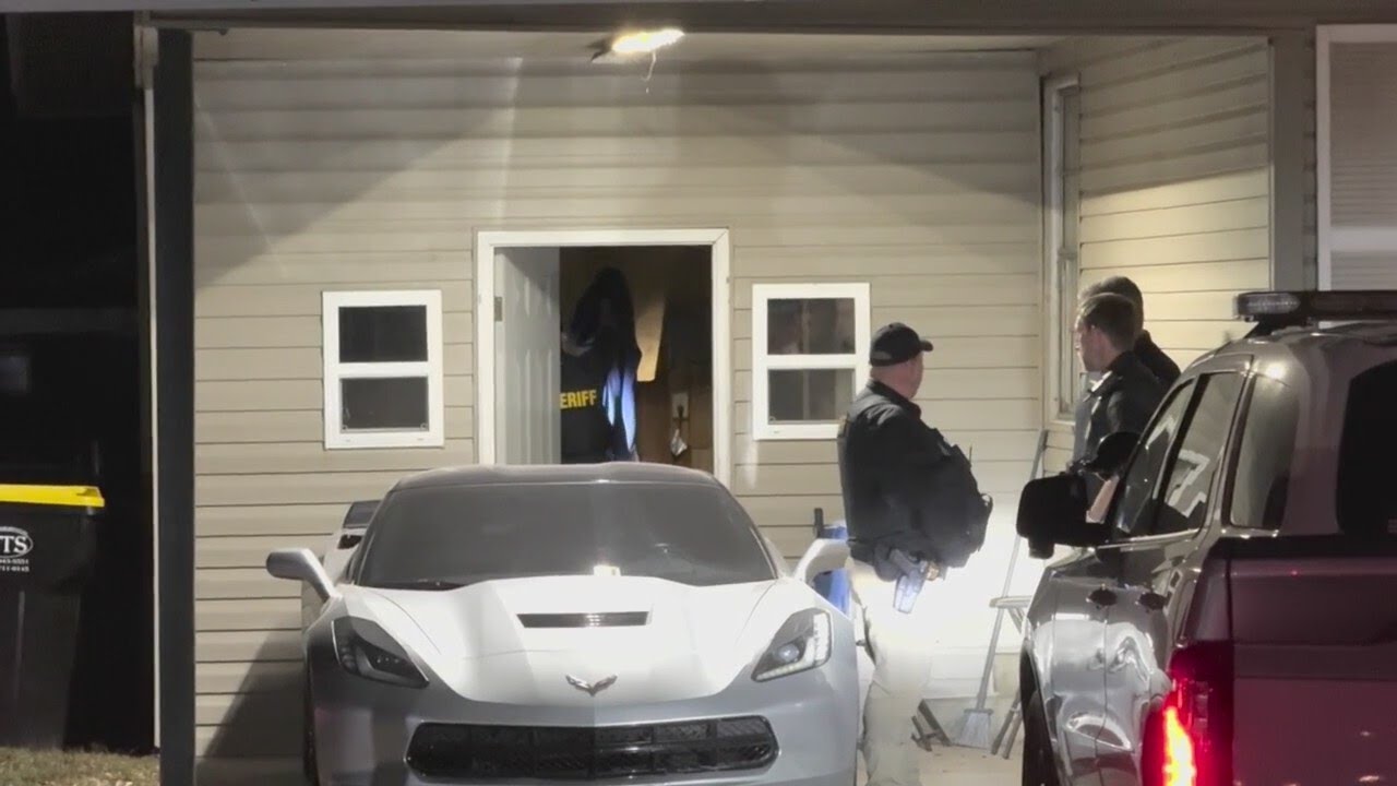 Authorities search home of England High School assistant principal ...