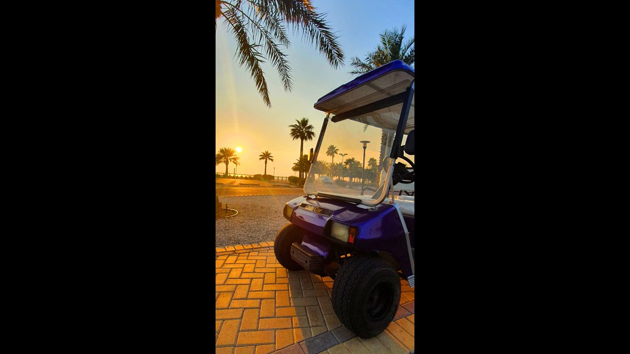 Purple Club Car with Beautiful Beach Sundown