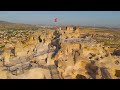 Uchisar, Nevsehir, Turkey. Aerial view of massive Uchisar Castle rock fortress dominating Cappado...
