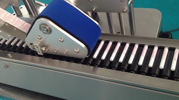 horizontal vial labeling machine from Higee Machinery